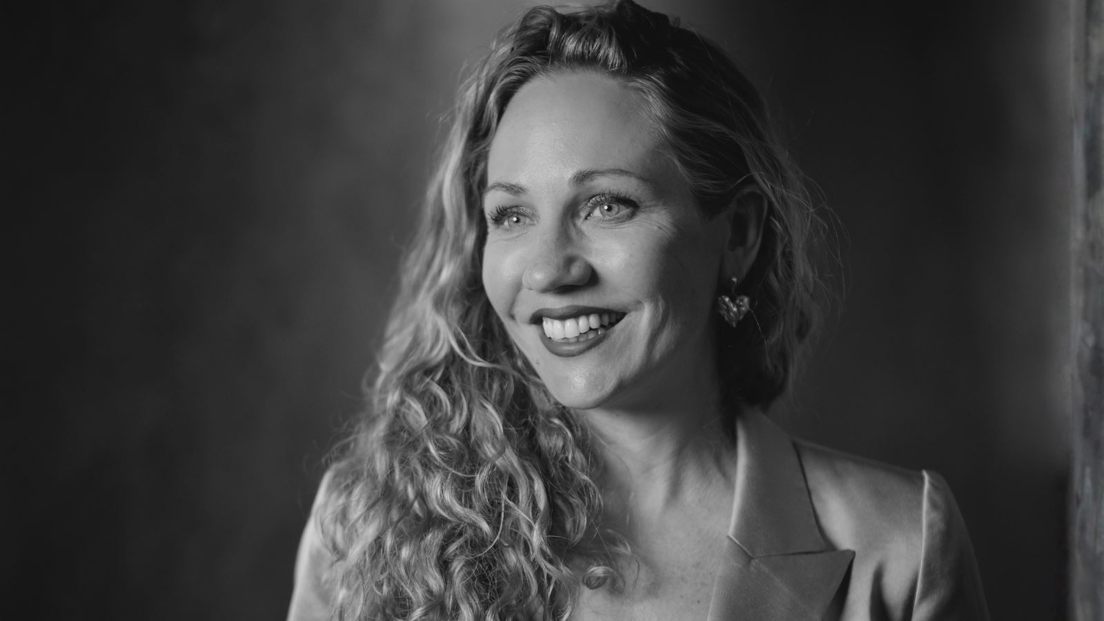 Black and white portrait of Emilya Colliver smiling